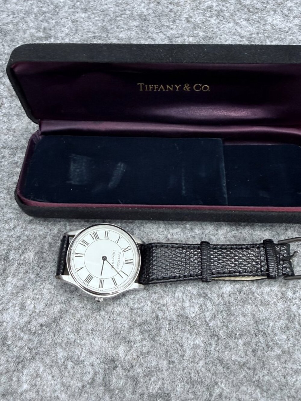 Vintage Tiffany & Co Portfolio Watch White Roman Dial Stainless Steel 33mm Swiss